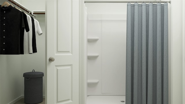 bathroom featuring a stall shower
