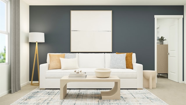 carpeted living area featuring baseboards