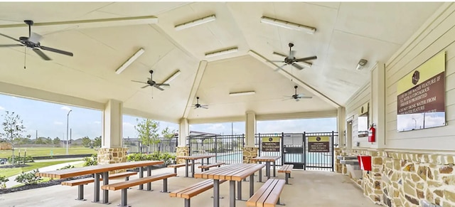 view of patio / terrace featuring fence and ceiling fan