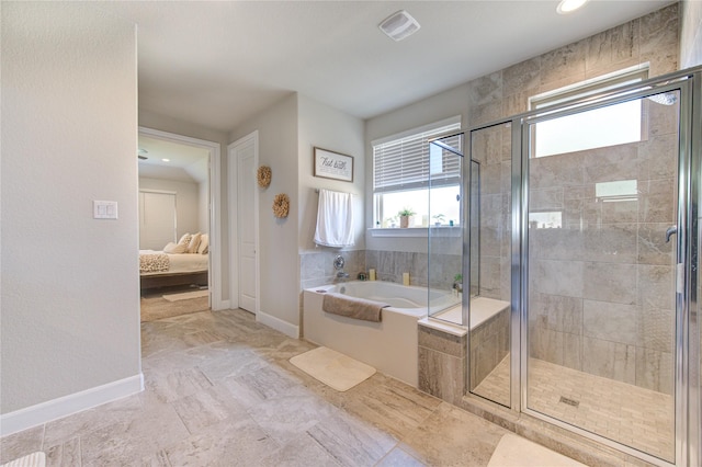 bathroom featuring visible vents, baseboards, connected bathroom, a garden tub, and a shower stall