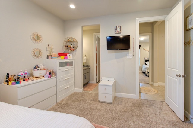 bedroom with recessed lighting, baseboards, and light colored carpet