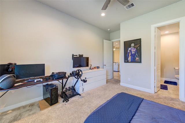 bedroom featuring recessed lighting, light colored carpet, visible vents, ensuite bath, and baseboards