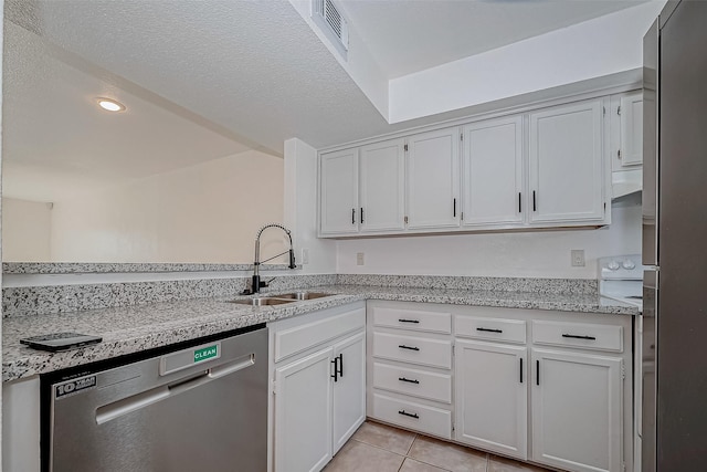 kitchen featuring a sink, white cabinets, and dishwasher