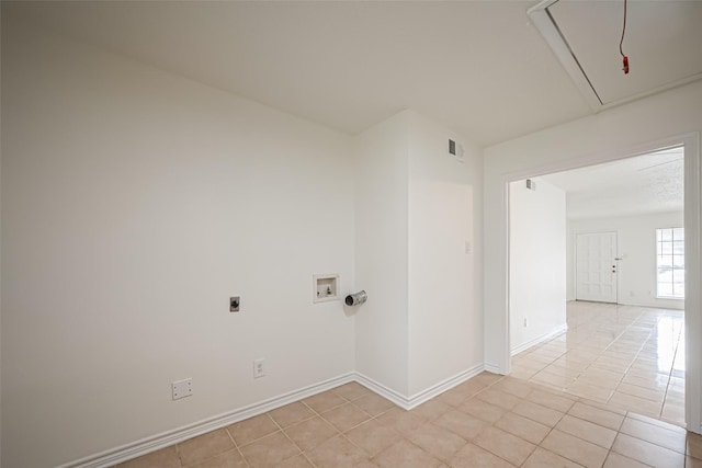 laundry room with hookup for a washing machine, attic access, hookup for an electric dryer, light tile patterned flooring, and laundry area