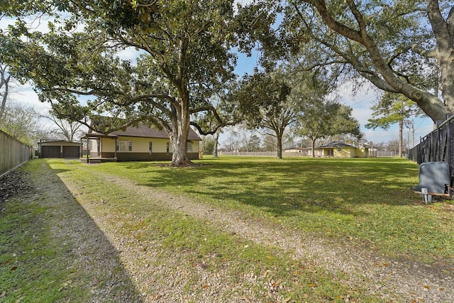 view of yard with fence