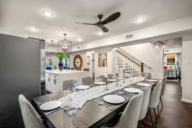 dining area featuring visible vents, ceiling fan, stairway, dark wood-style flooring, and recessed lighting