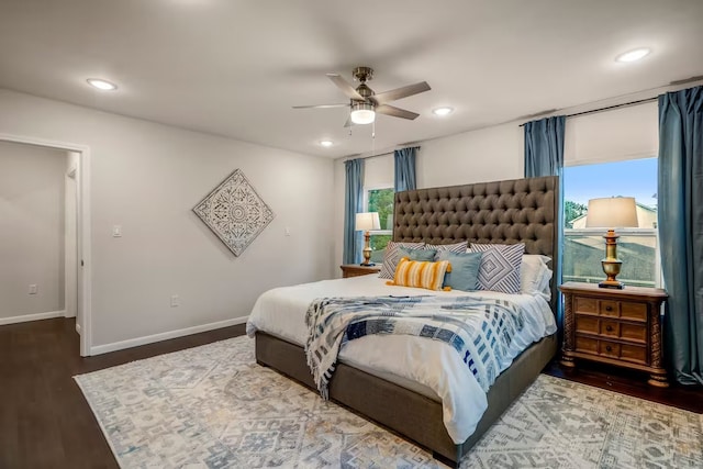 bedroom featuring dark wood-style flooring, recessed lighting, a ceiling fan, and baseboards