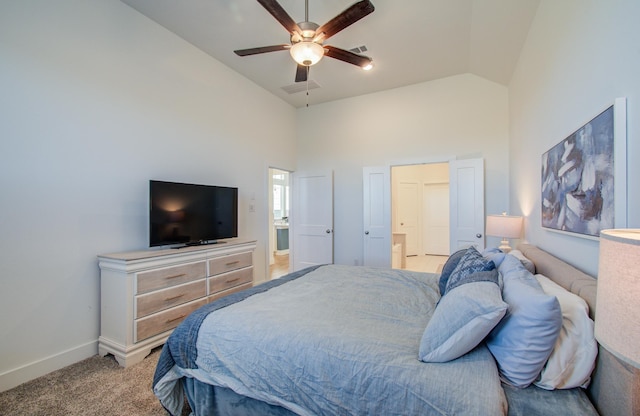 bedroom featuring ceiling fan, high vaulted ceiling, light carpet, visible vents, and baseboards