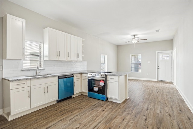kitchen with dishwashing machine, a peninsula, a sink, white cabinetry, and stainless steel electric stove