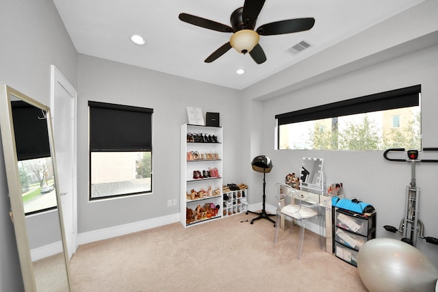 interior space with light colored carpet, visible vents, baseboards, and recessed lighting