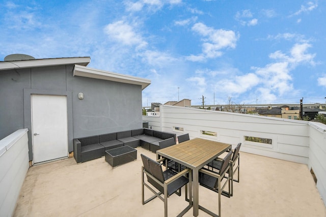 view of patio featuring outdoor dining space and an outdoor living space