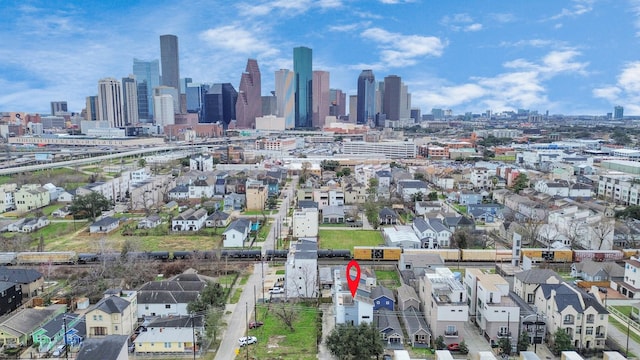 birds eye view of property featuring a view of city