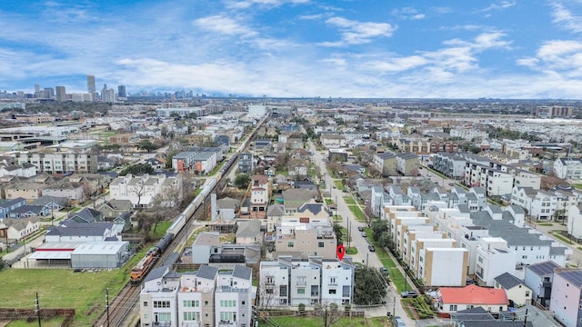 birds eye view of property featuring a view of city