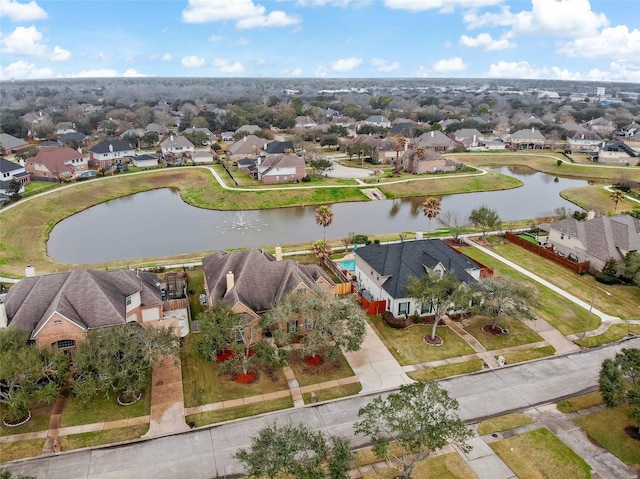 aerial view featuring a residential view and a water view