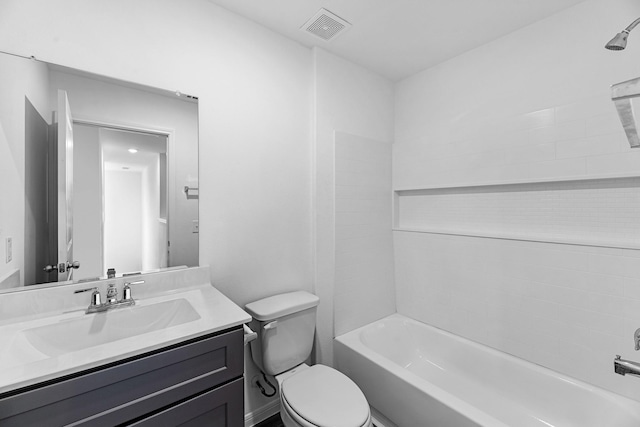 bathroom featuring visible vents, vanity, toilet, and shower / bathtub combination