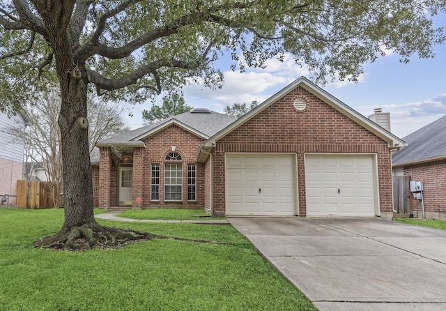 view of front of home featuring brick siding, an attached garage, fence, driveway, and a front lawn