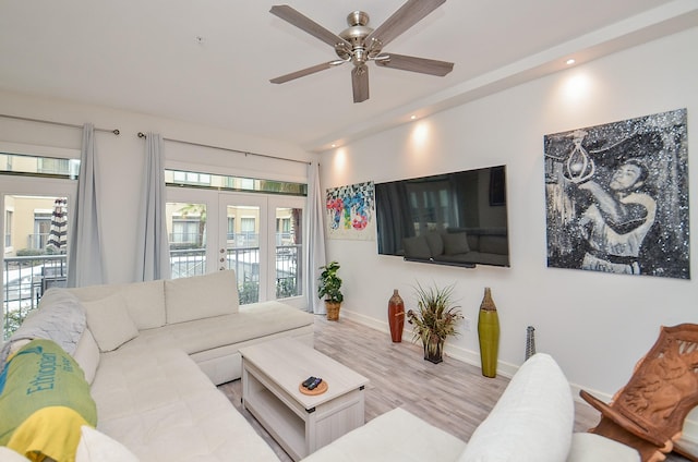 living room featuring french doors, recessed lighting, ceiling fan, wood finished floors, and baseboards