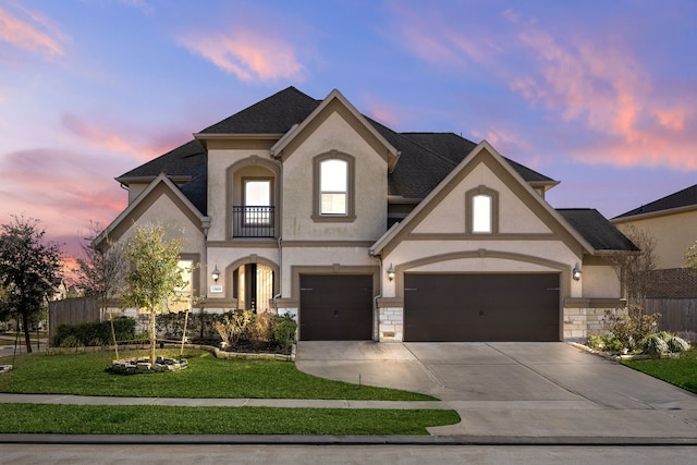 view of front of house featuring a balcony, stone siding, and stucco siding