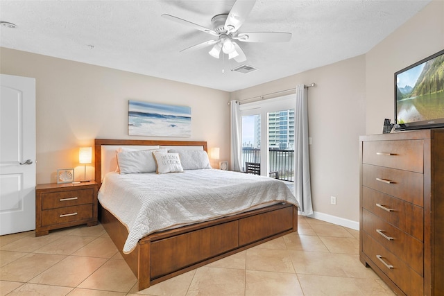 bedroom with light tile patterned flooring, visible vents, baseboards, a ceiling fan, and access to outside