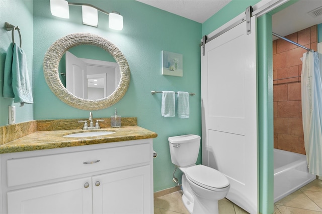 bathroom with shower / tub combo with curtain, toilet, vanity, baseboards, and tile patterned floors