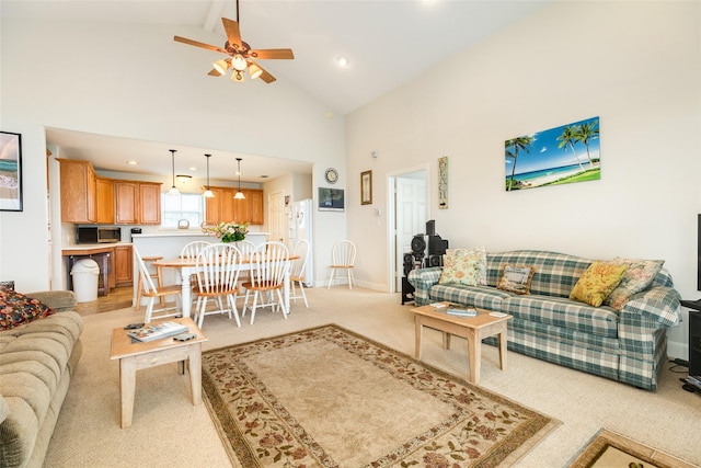 living room featuring high vaulted ceiling, light colored carpet, a ceiling fan, baseboards, and beamed ceiling