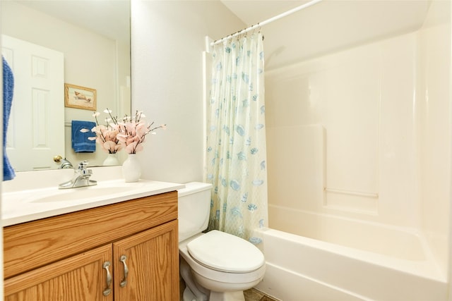 bathroom with shower / bath combination with curtain, vanity, and toilet