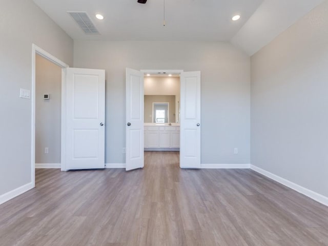 unfurnished bedroom featuring light wood-type flooring, visible vents, baseboards, and recessed lighting