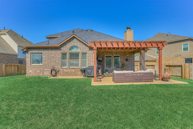 back of property featuring brick siding, a yard, a chimney, an outdoor hangout area, and a patio area