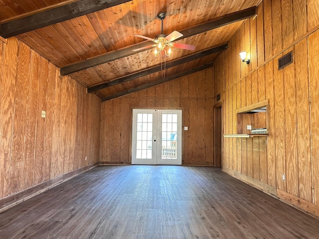 spare room featuring dark wood-style floors, french doors, lofted ceiling with beams, wood ceiling, and ceiling fan