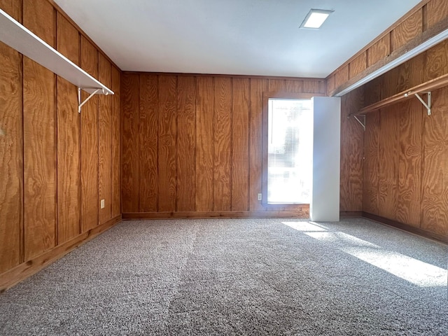 interior space featuring wood walls