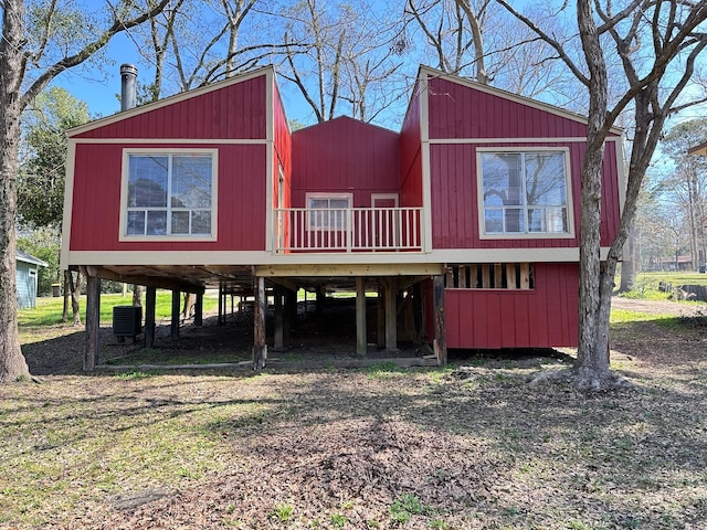 view of front of home with a deck and central AC unit