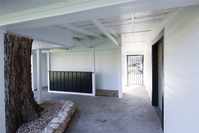 interior space with unfinished concrete flooring