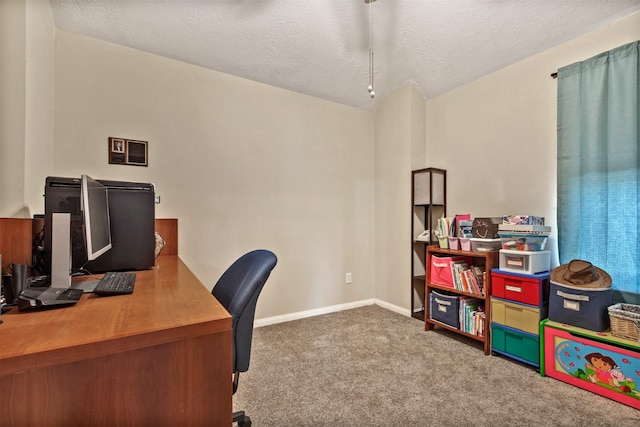 office space with a textured ceiling, carpet flooring, and baseboards