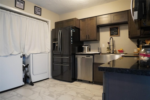 kitchen with marble finish floor, stainless steel dishwasher, a textured ceiling, dark brown cabinets, and black fridge