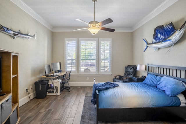 bedroom featuring dark wood-type flooring, ornamental molding, and baseboards