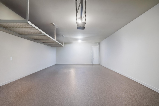 garage featuring baseboards