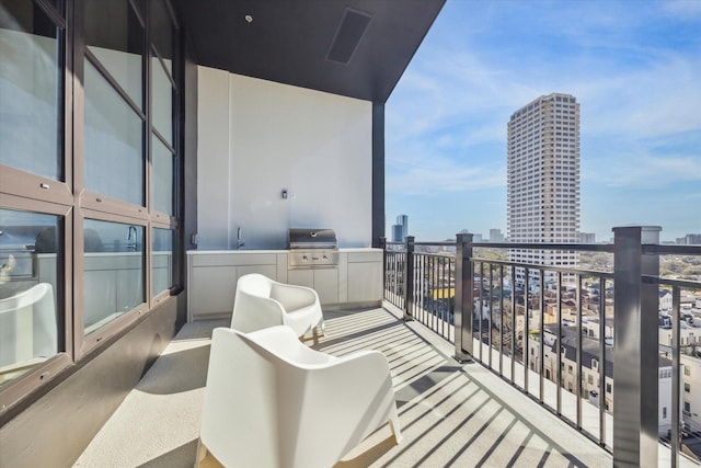 balcony featuring a view of city and a grill