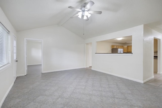 unfurnished living room with lofted ceiling with beams, ceiling fan, and baseboards