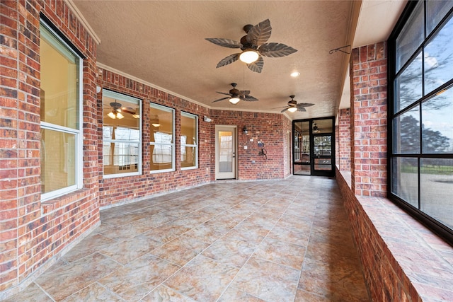 unfurnished sunroom with a healthy amount of sunlight