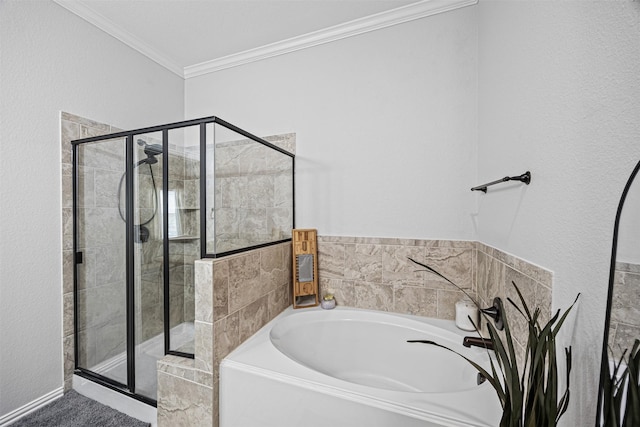 full bathroom featuring a stall shower, a bath, and crown molding