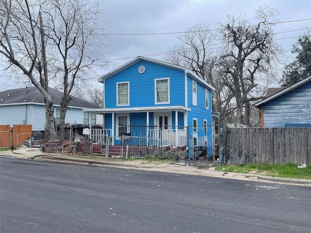 view of front of house with a fenced front yard