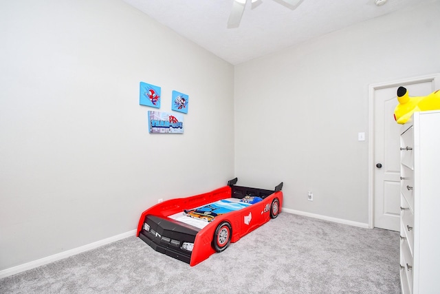 bedroom featuring ceiling fan, baseboards, and carpet flooring