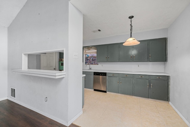 kitchen with light countertops, hanging light fixtures, visible vents, and stainless steel dishwasher