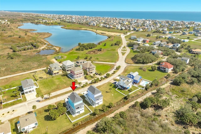 aerial view featuring a water view and a residential view