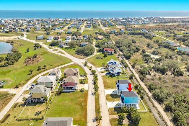 aerial view with a residential view and a water view