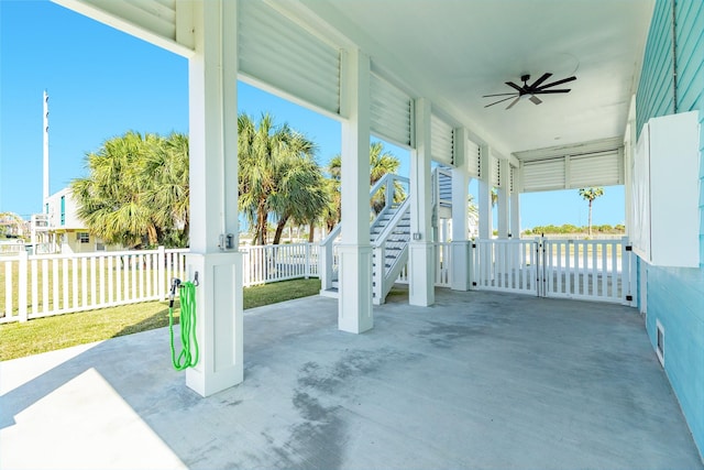 view of patio / terrace with a ceiling fan and visible vents