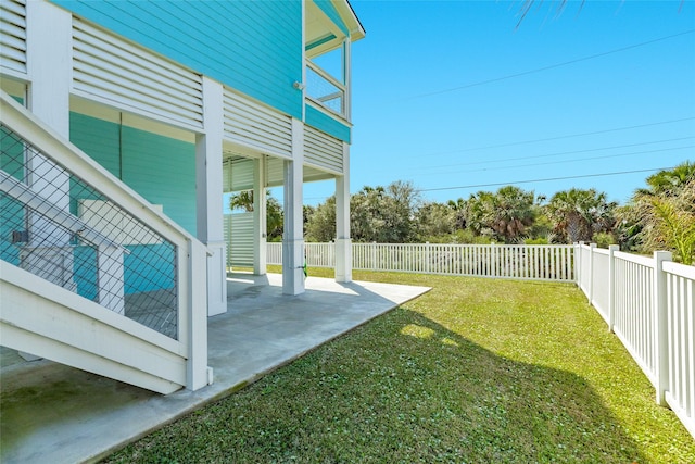 view of yard with a patio and a fenced backyard