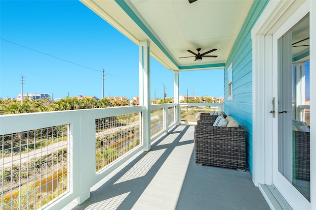 balcony featuring a ceiling fan