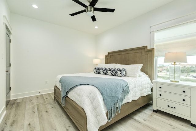 bedroom with light wood-type flooring, baseboards, a ceiling fan, and recessed lighting