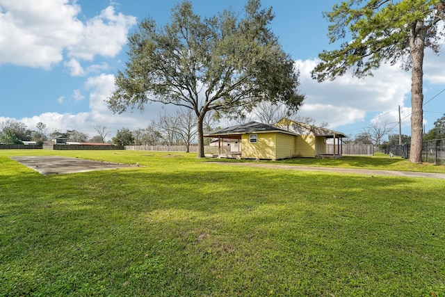 view of yard with fence